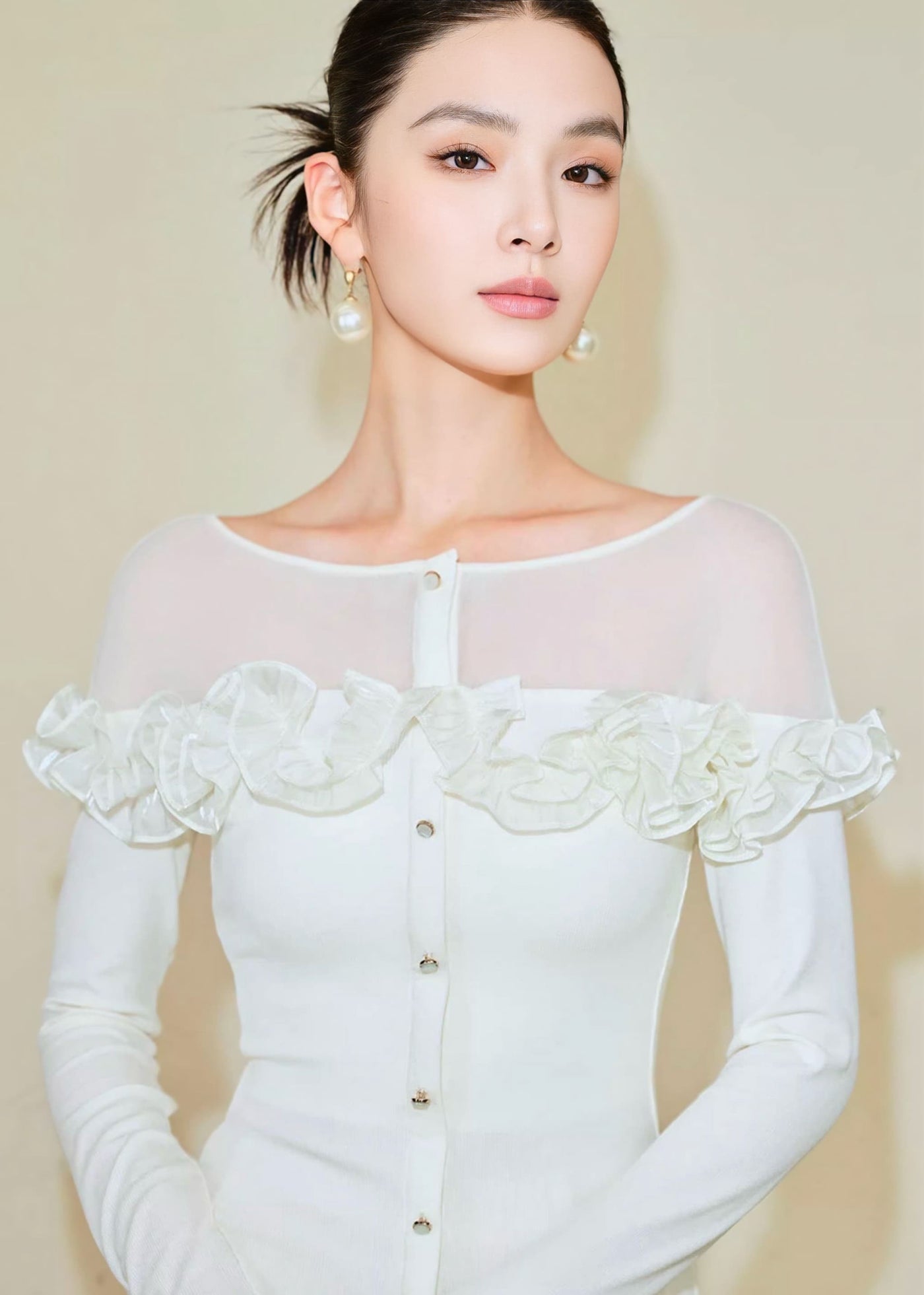 デコルテシアーフリルスリムカーディガン